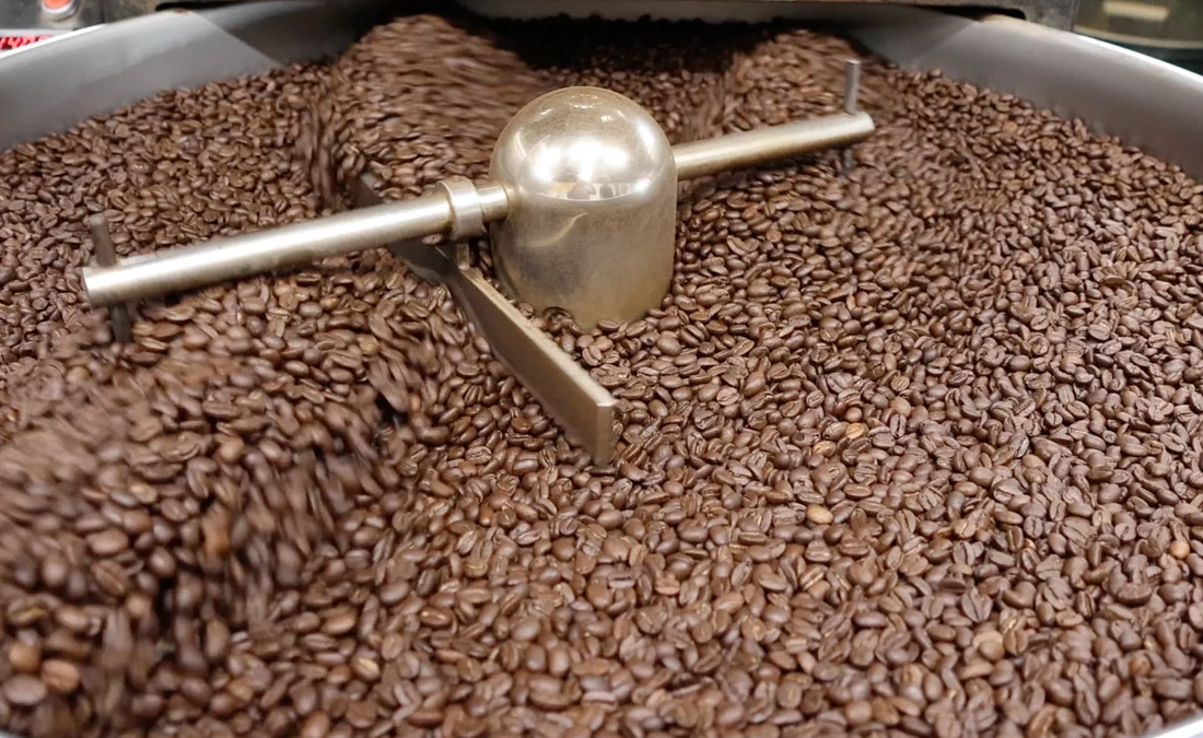 Beans turning in a coffee roaster drum